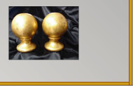 Gold leaf finish over Pompeiian red