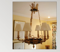 Chandelier with tete de negre and gold leaf