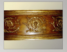 French walnut with gilded ornamentation and molding